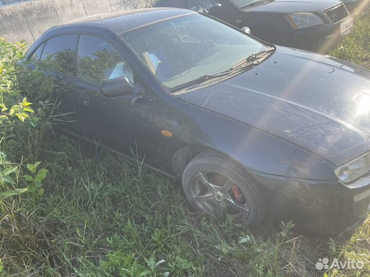 Двери передние mazda 323f