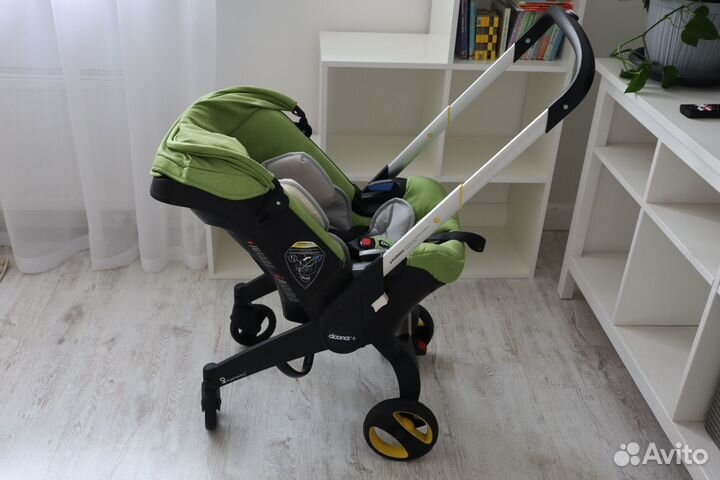 Коляска-автокресло Doona с базой isofix