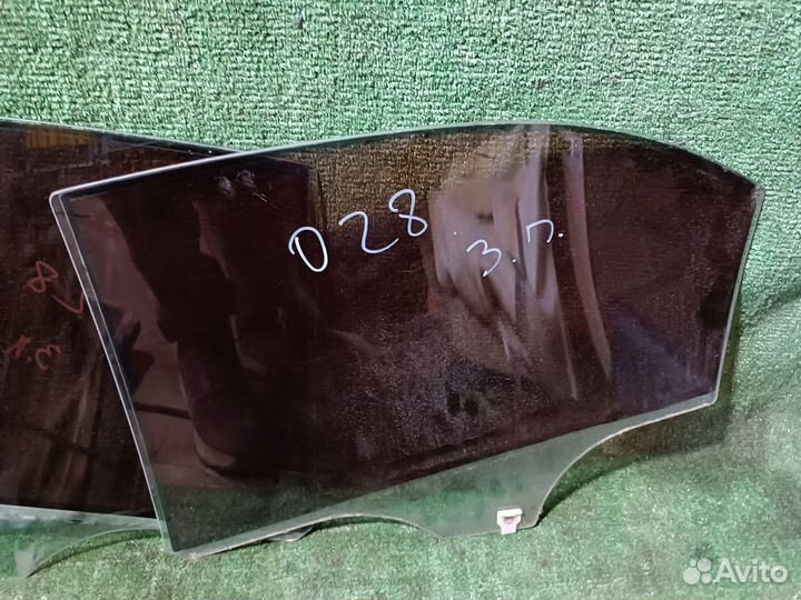 Стекло двери задней левой Mazda 6