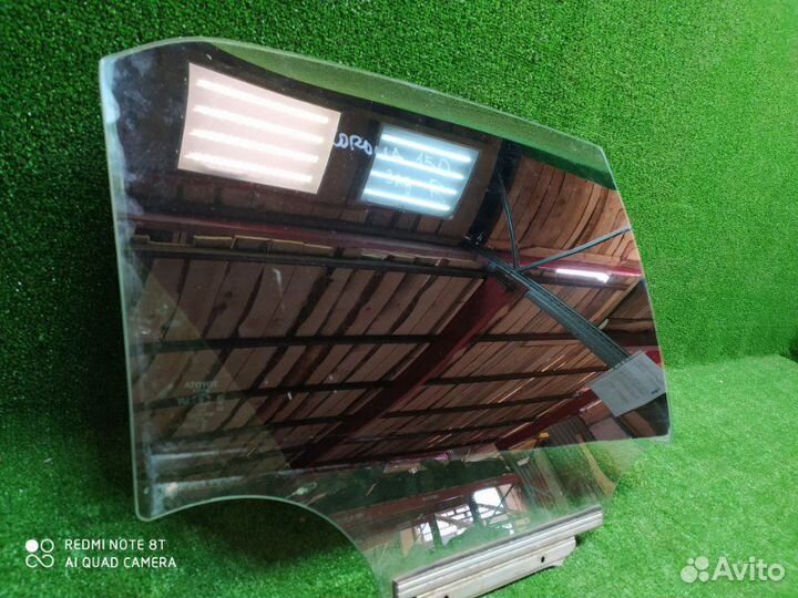 Стекло двери заднее правое Toyota Corolla 150