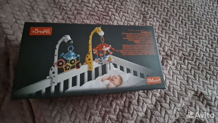 Детский мобиль в кроватку музыкальный