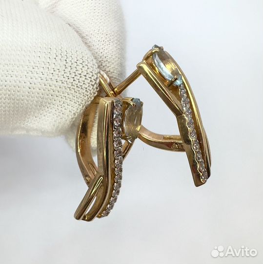 Золотые серьги с камнем