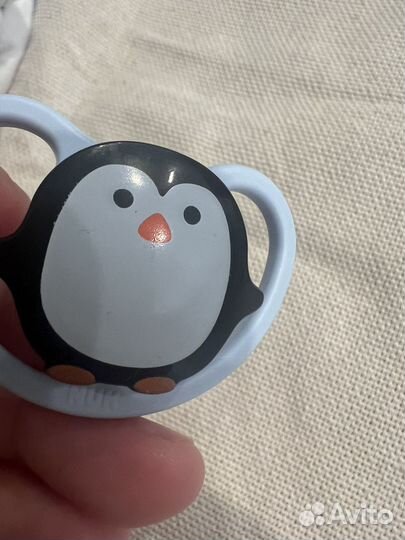 Книжка бортик,соска Nuk,термометр,бутылочка