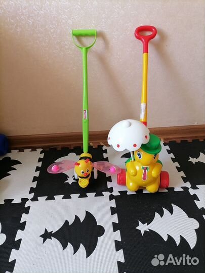 Игрушка- каталка с ручкой