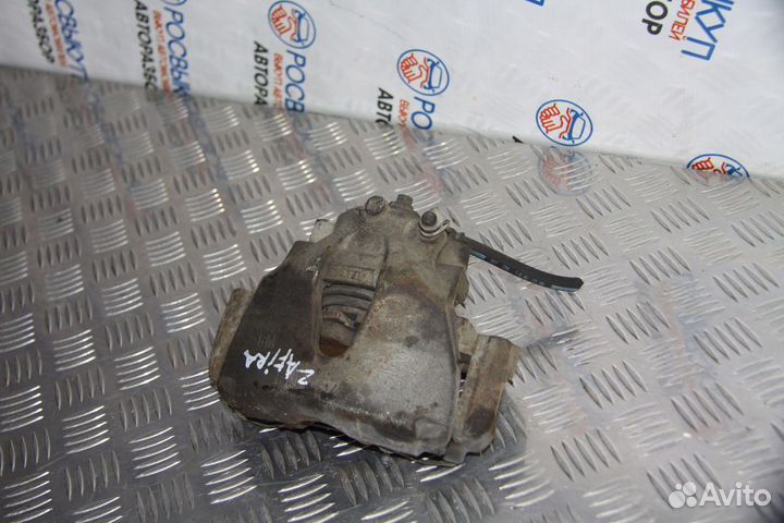 Суппорт тормозной Opel Zafira