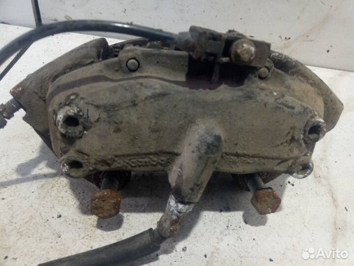 Суппорт тормозной передний левый Mercedes-Benz