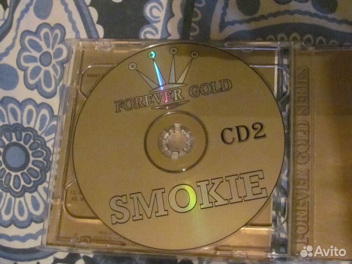 Двойной диск Смоки, диски с фильмами и значки