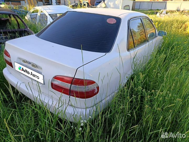 Toyota Corolla 1.6 AT, 1997, 300 000 км
