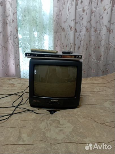 Телевизор sharp с проигрывателем и дисками