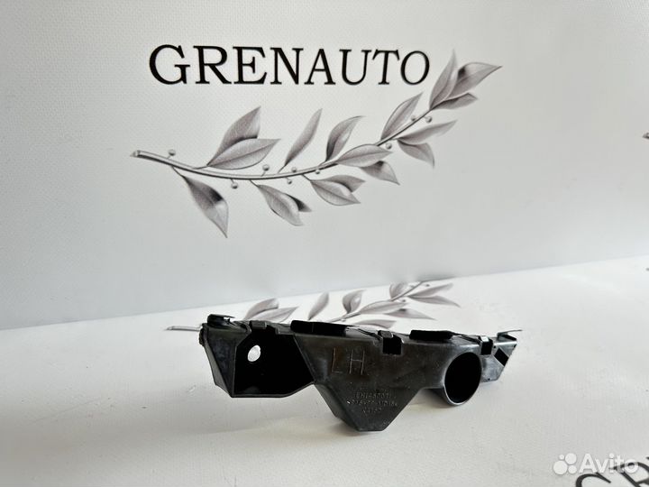 Mazda CX 7 кронштейн переднего бампера левый 07-12