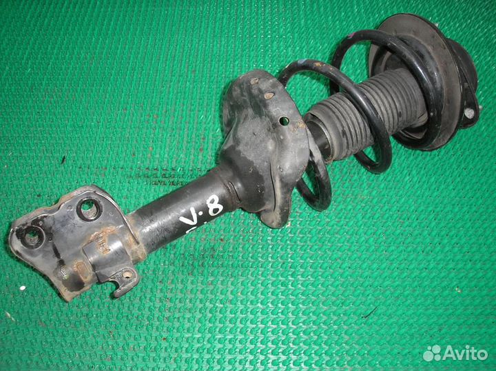 Стойка амортизатора передняя левая Subaru Legacy