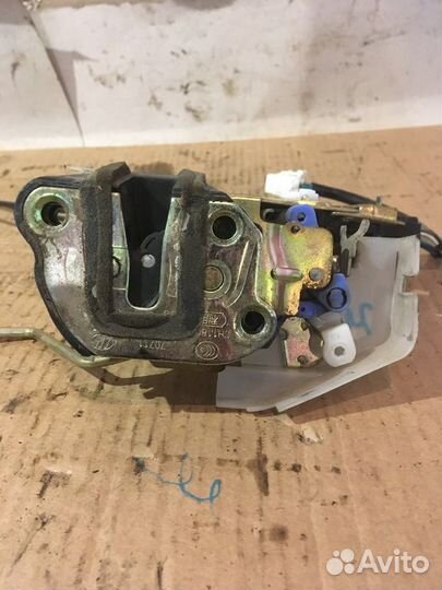 Замок двери передний левый Lifan X50