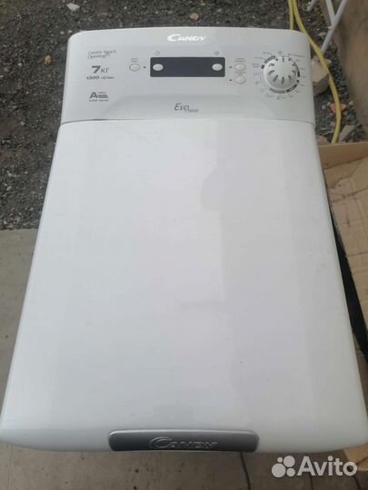 Стиральная машина с вертикальной загрузкой candy