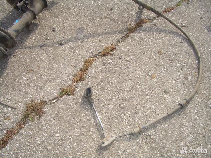 Трос стояночного тормоза левый chevrolet Lacetti