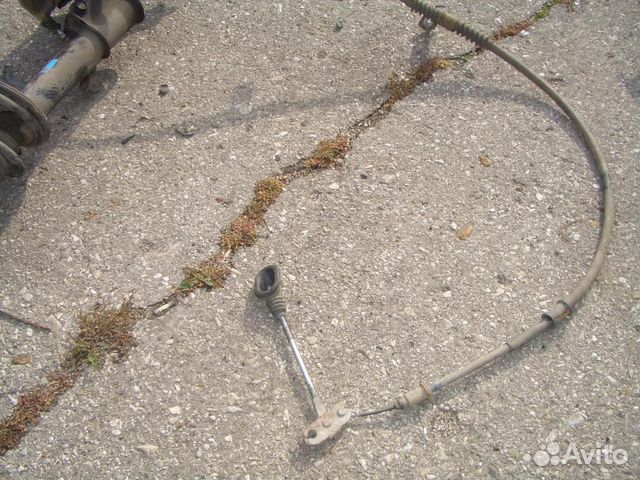 Трос стояночного тормоза левый chevrolet Lacetti