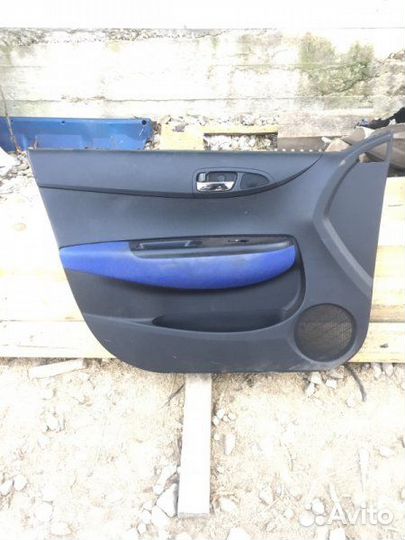 Обшивка двери передняя левая Hyundai I20 2008-2012