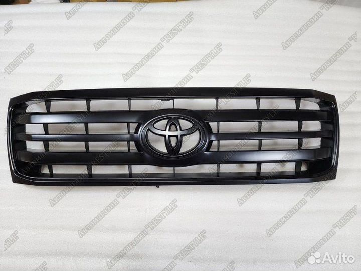 Решетка радиатора передняя Toyota Land Cruiser 100