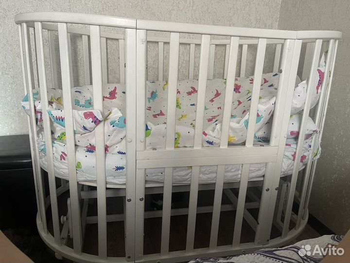 Детская кроватка трансформер с маятником