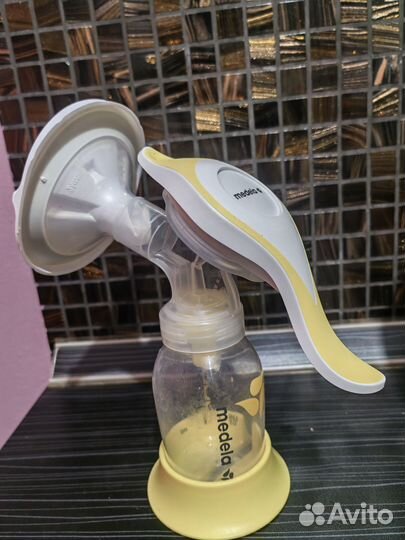 Молокоотсос medela ручной