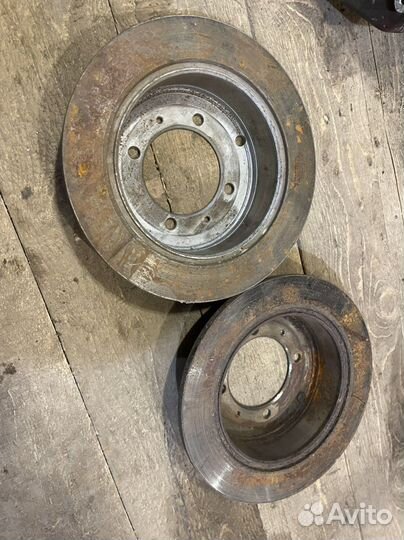 Тормозной диск задний Mitsubishi Lancer 9