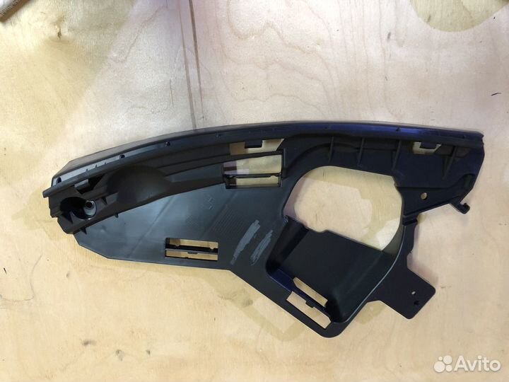 Кронштейн бампера переднего левый