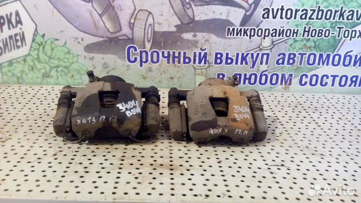 Суппорт тормозной передний Chevrolet Lanos