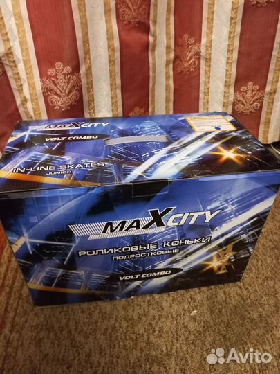 Роликовые коньки