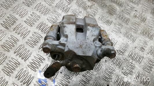 Суппорт тормозной задний левый toyota RAV 4 ZSA3