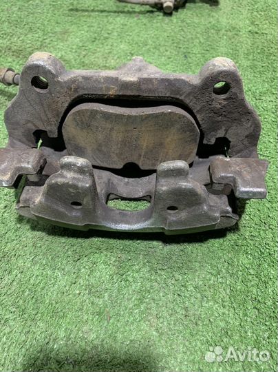 Передний левый тормозной суппорт Opel Vectra C