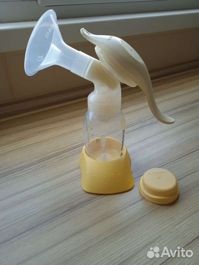 Молокоотсос medela ручной