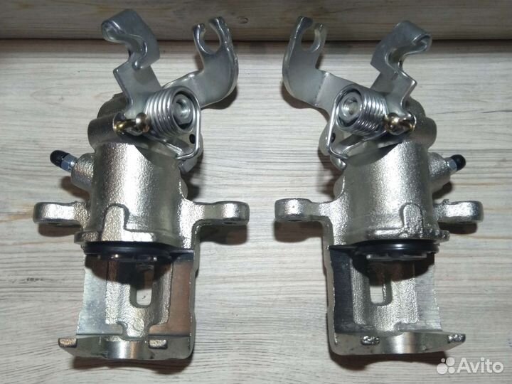 Суппорт задний правый / левый hyundai elantra 3