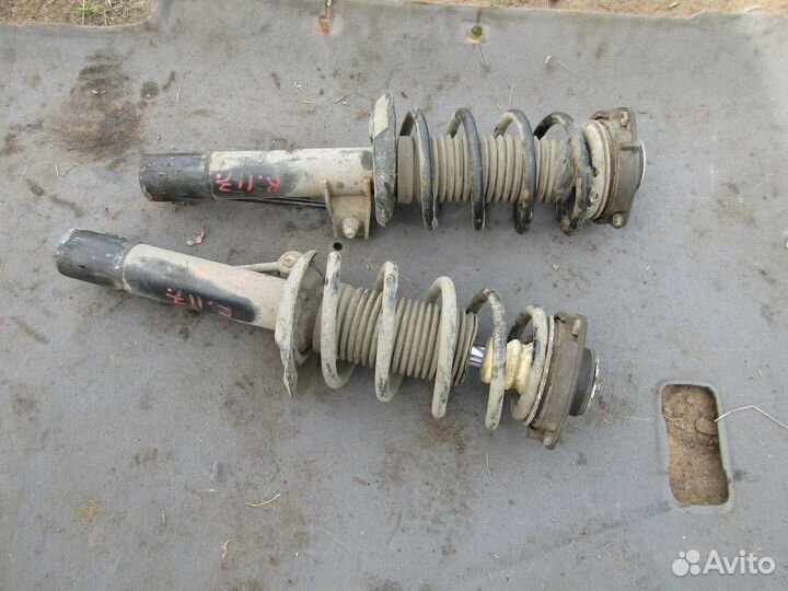 Стойка передняя Фольксваген Пассат б6