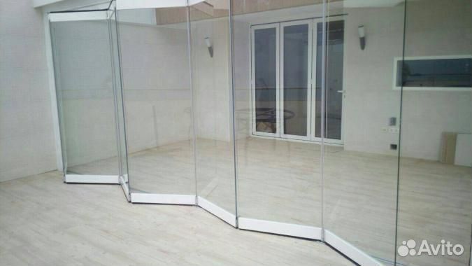 Раздвижное безрамное остекление гармошка