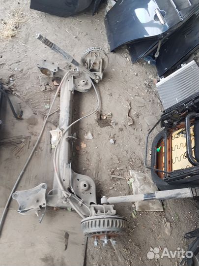 Almera G15 привод подрамник стойка пружина в разб