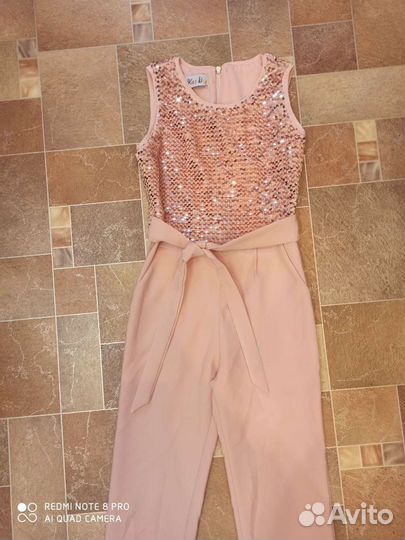 Нарядный комбинезон для девочки 128