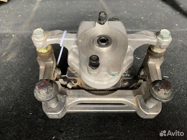 Суппорт задний левый Tesla Model 3