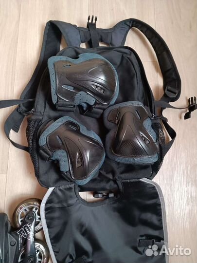 Роликовые коньки