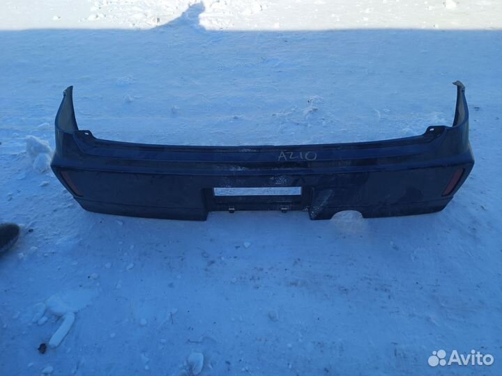 Задний бампер nissan cube 2001