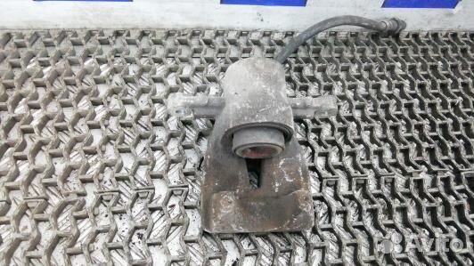 Суппорт тормозной задний левый toyota avensis T25