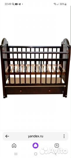 Детская кроватка с маятником и ящиком