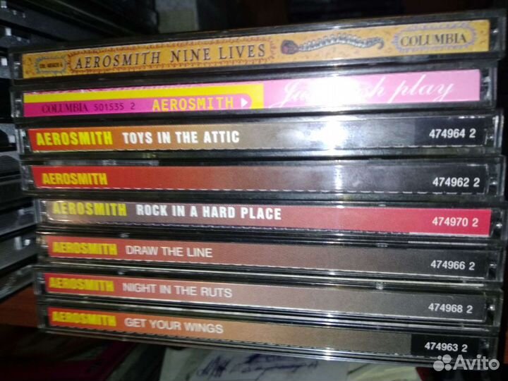 Фирменные CD Kiss, Madonna, Aerosmith
