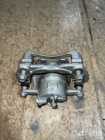 Суппорт тормозной Тойота Королла 150