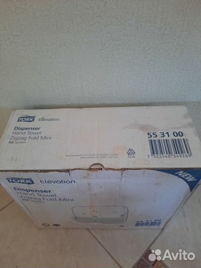 Диспенсер для бумажных полотенец tork