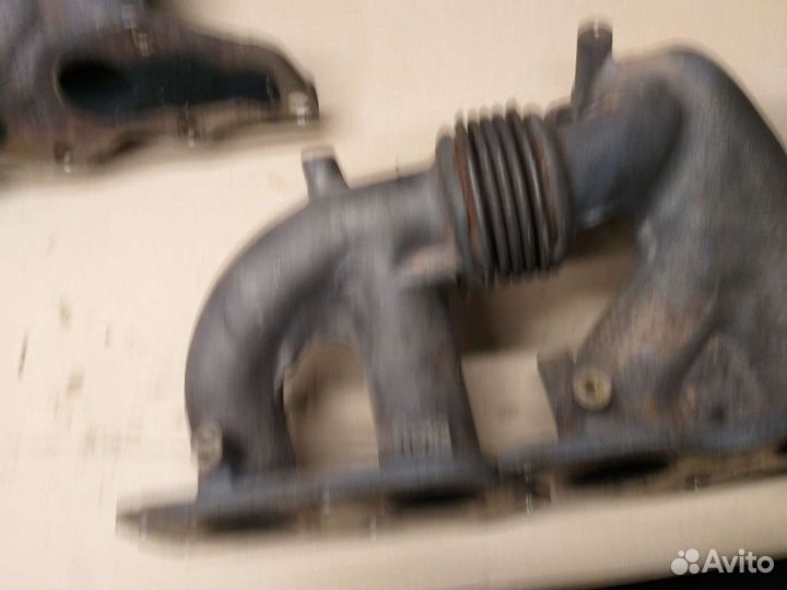 Коллектор выпускной 2.3 турбо Мазда сх7 оригинал