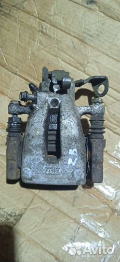 Суппорт задний левый Opel Zafira b