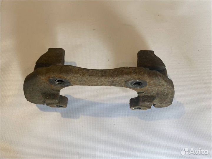 Скоба суппорта переднего Ford Focus