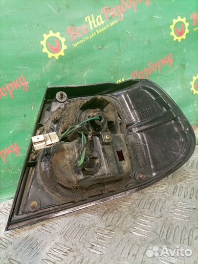 Фонарь задний левый Nissan Almera N 15 1.4 GAL 4