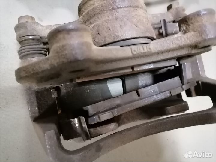 Суппорт тормозн.передн.Nissan Almera N15 CD20 1997