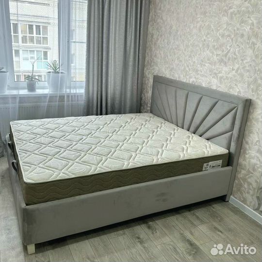 Кровать с подъемным механизмом