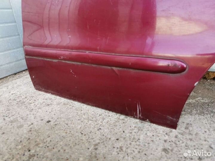 Дверь задняя левая со стеклом (Daewoo Leganza)